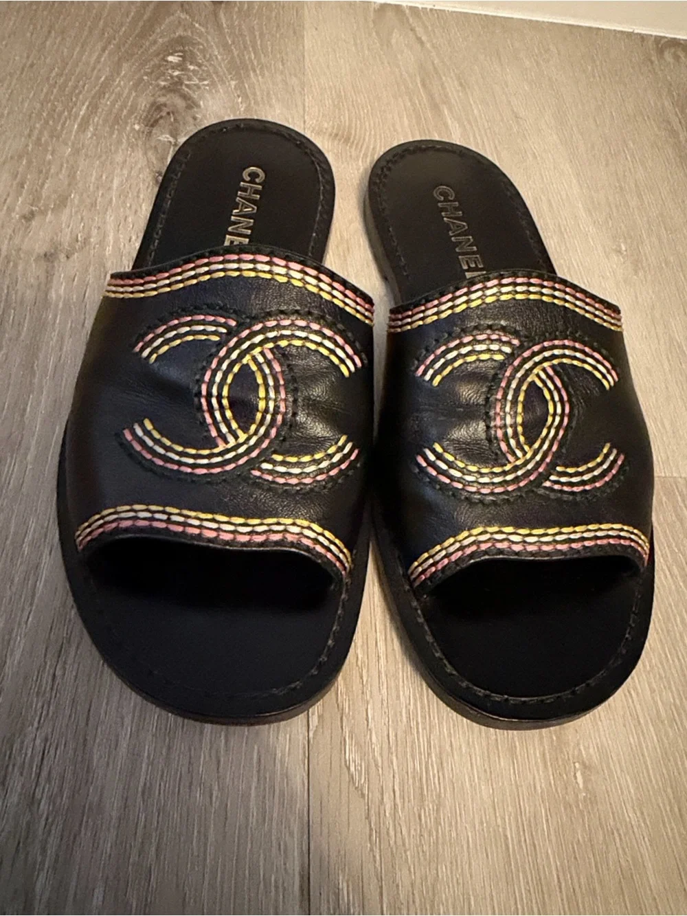 CHANEL Black Leather Slide Sandals with Pink and Yellow Stitching